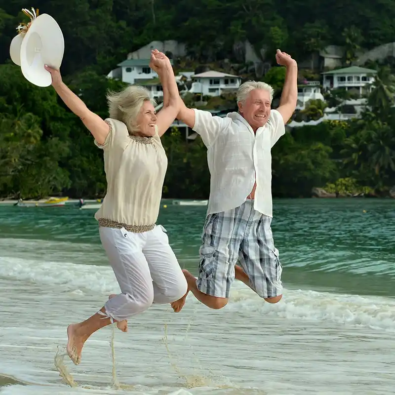 Smart Health Insurance Medicare couple at the beach